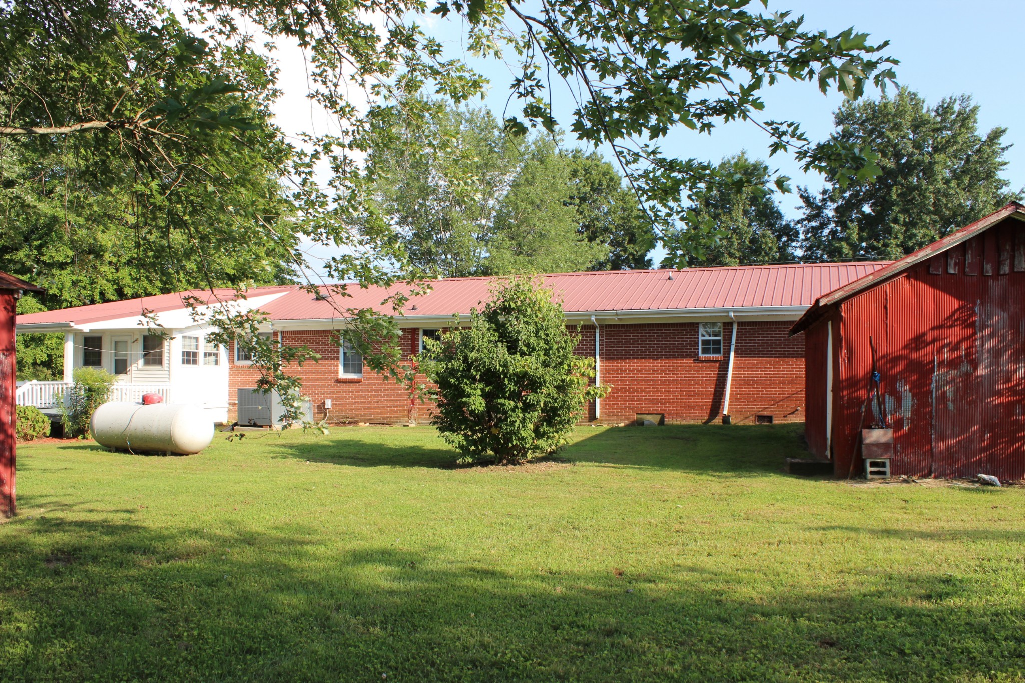 512 Limestone Road Elora, TN 37328 - Photo 35 of 44 a front view of a house with garden