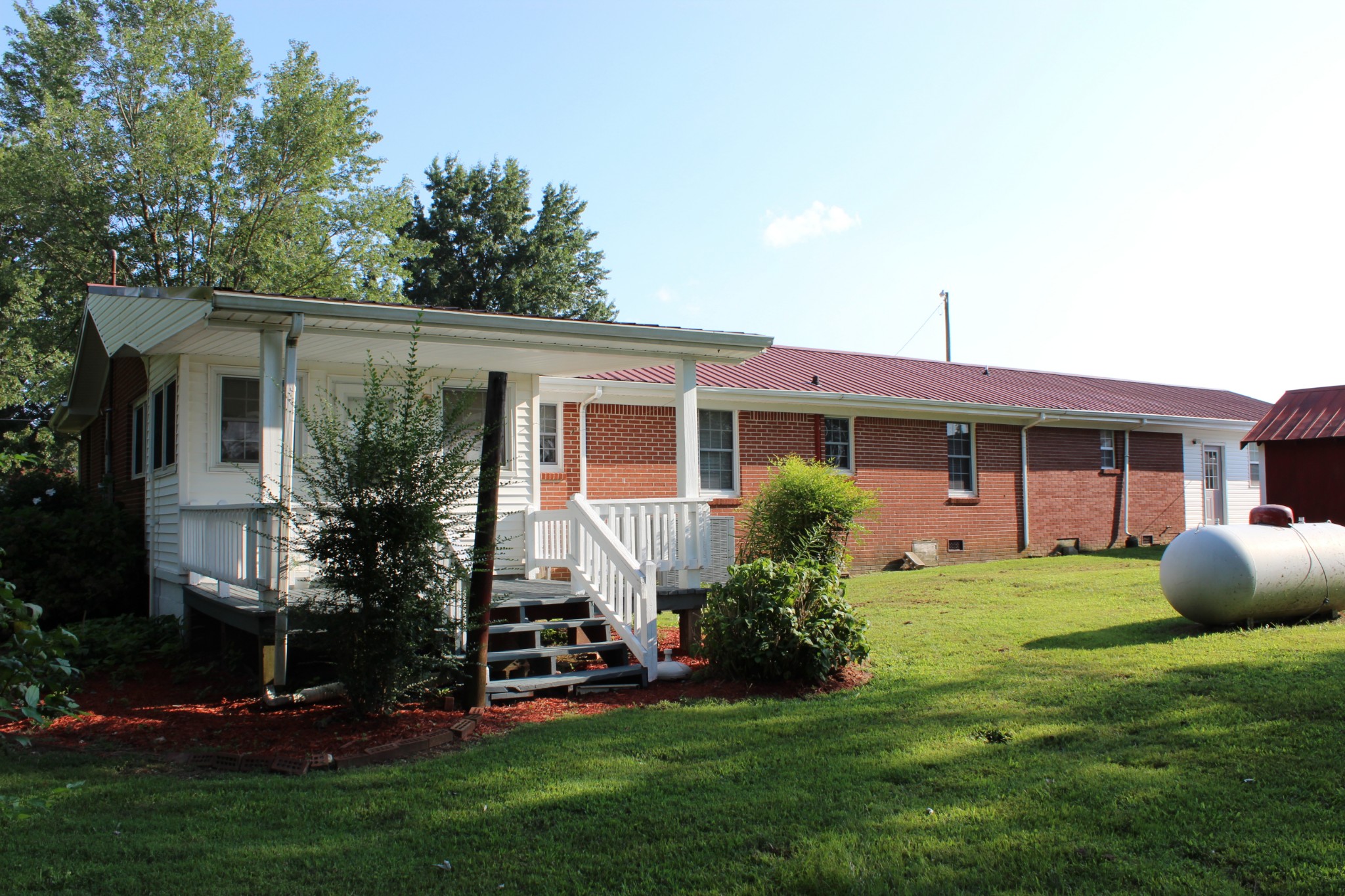 512 Limestone Road Elora, TN 37328 - Photo 38 of 44 a front view of house with yard and outdoor seating