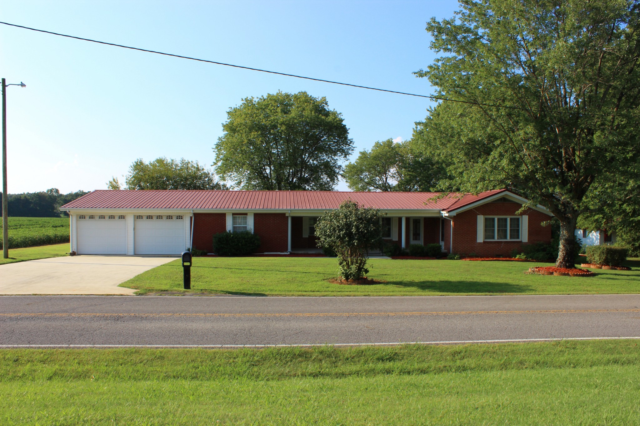 512 Limestone Road Elora, TN 37328 - Photo 43 of 44 a view of a house next to a yard