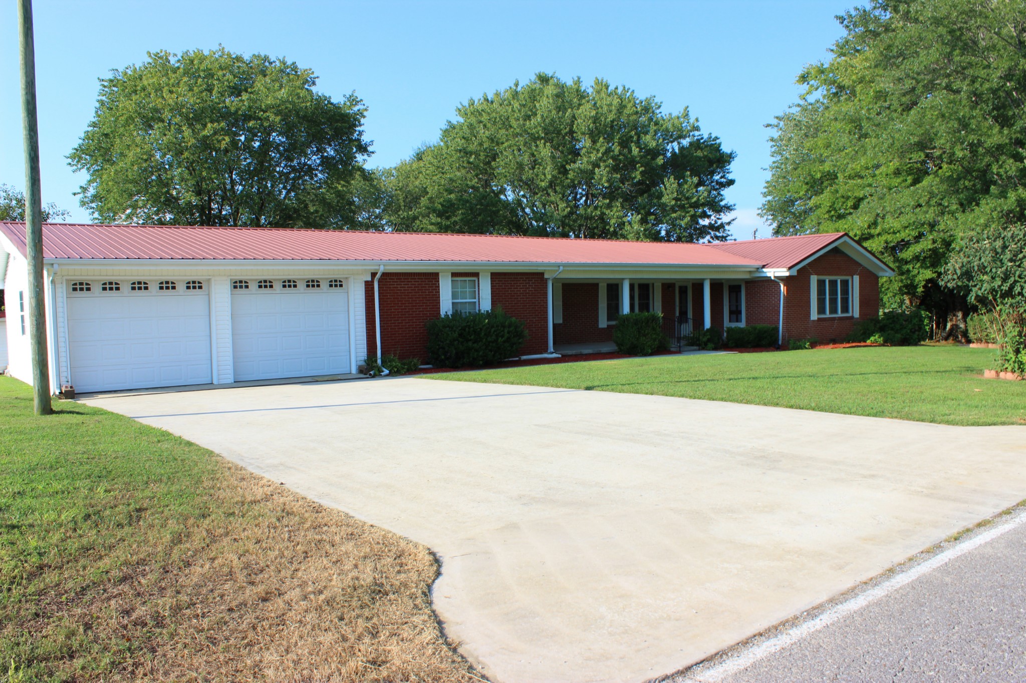 512 Limestone Road Elora, TN 37328 - Photo 44 of 44 a front view of a house with a garden