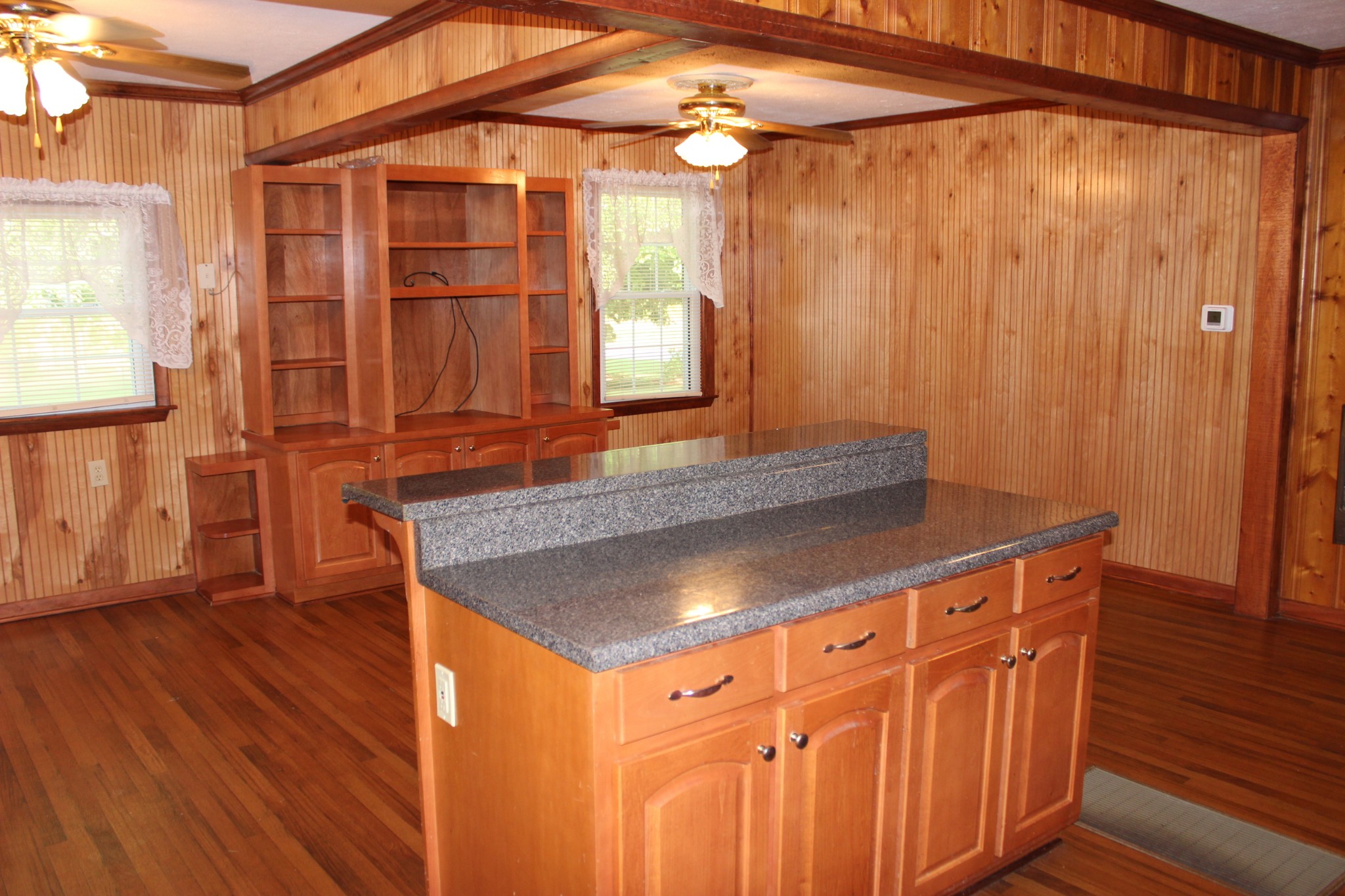 512 Limestone Road Elora, TN 37328 - Photo 7 of 44 a room with wooden cabinets and wooden floor