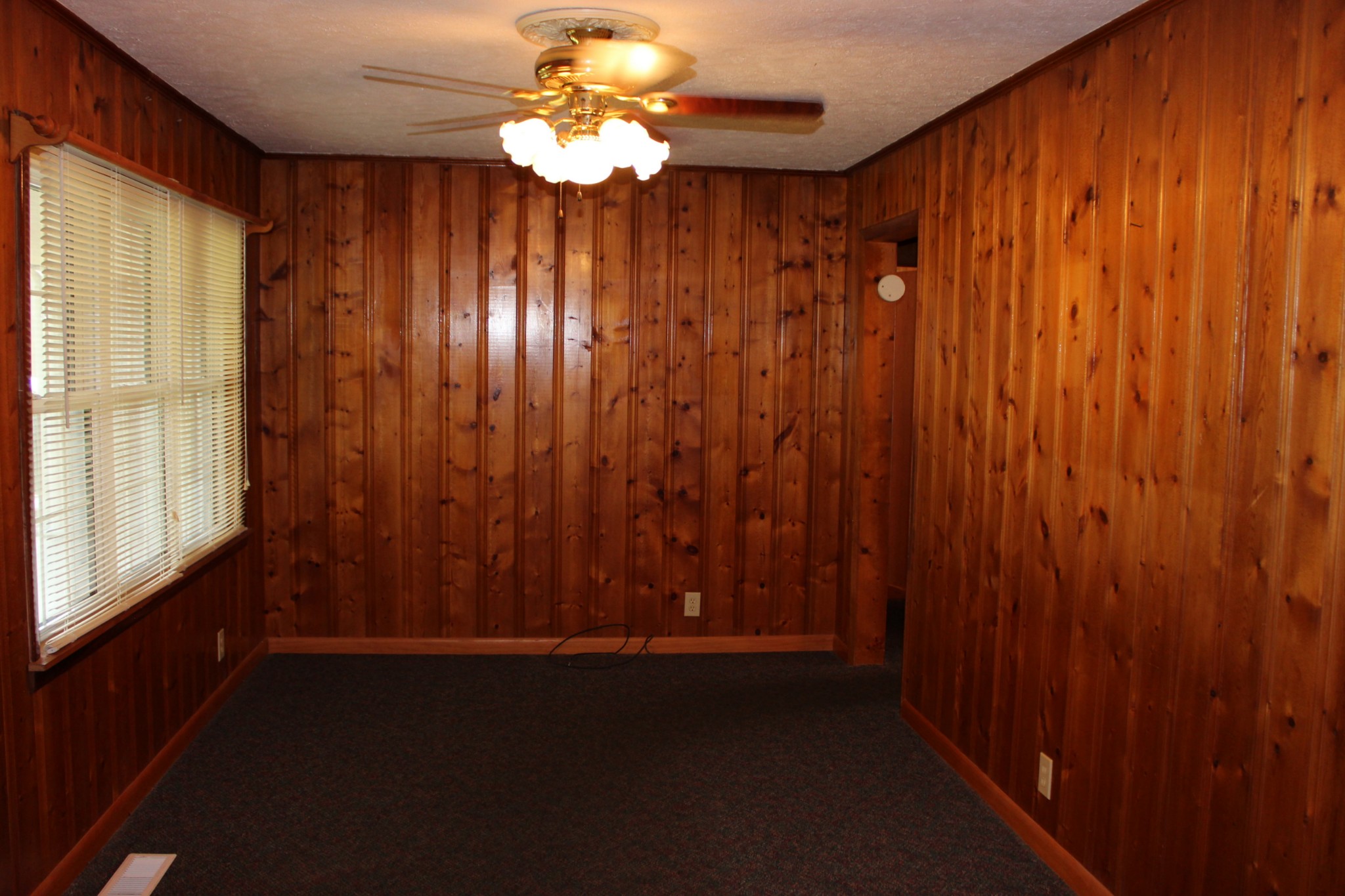 512 Limestone Road Elora, TN 37328 - Photo 9 of 44 wooden floor in an empty room with a window