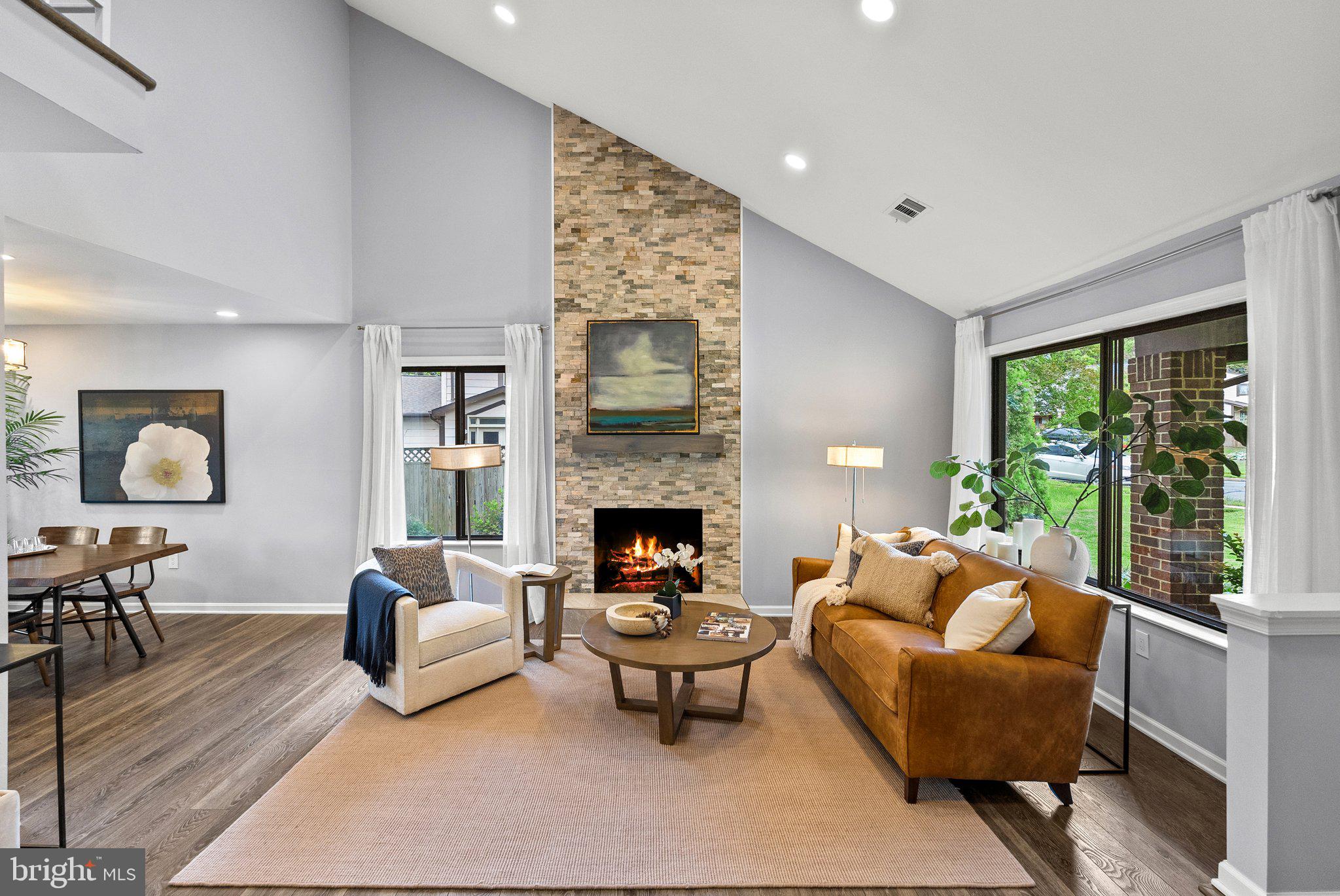 4431 Flintstone Road Alexandria, VA 22306 - Photo 7 of 57 Spacious family room with wood burning fireplace