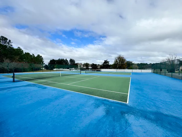 a view of a park with swings