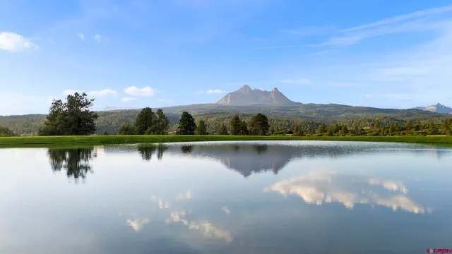 a view of lake with mountain