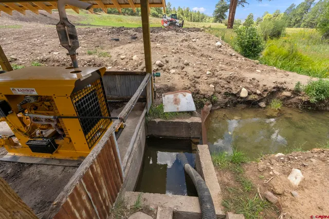 a view of balcony with wooden floor