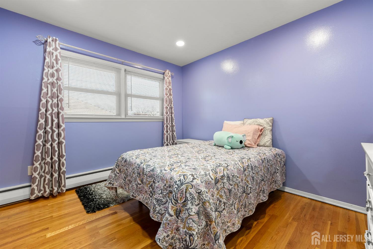 2291 Morrison Avenue Union, NJ 07083 - Photo 13 of 28 a bedroom with a bed and a window