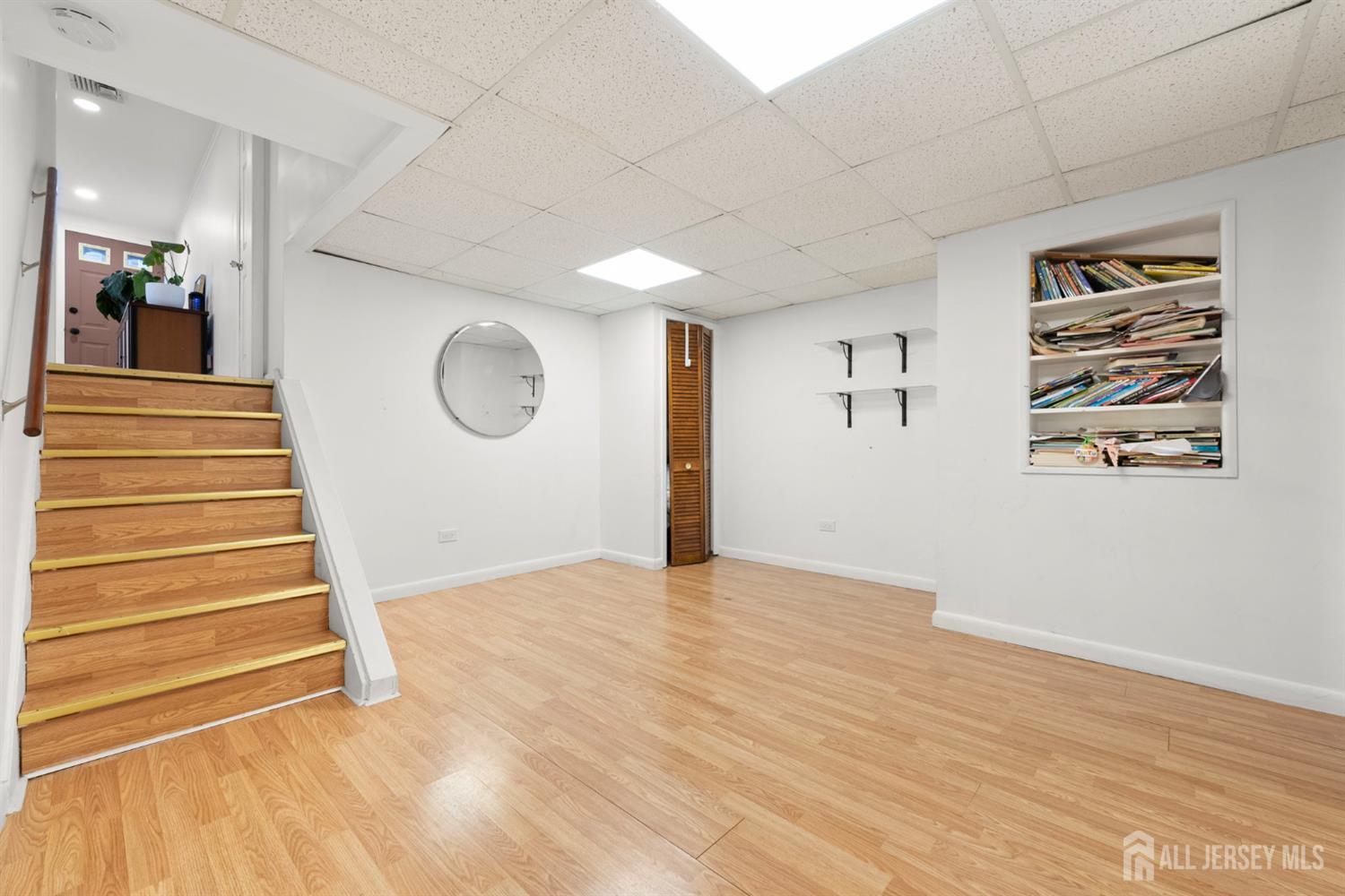 2291 Morrison Avenue Union, NJ 07083 - Photo 21 of 28 a view of a room with wooden floor and window