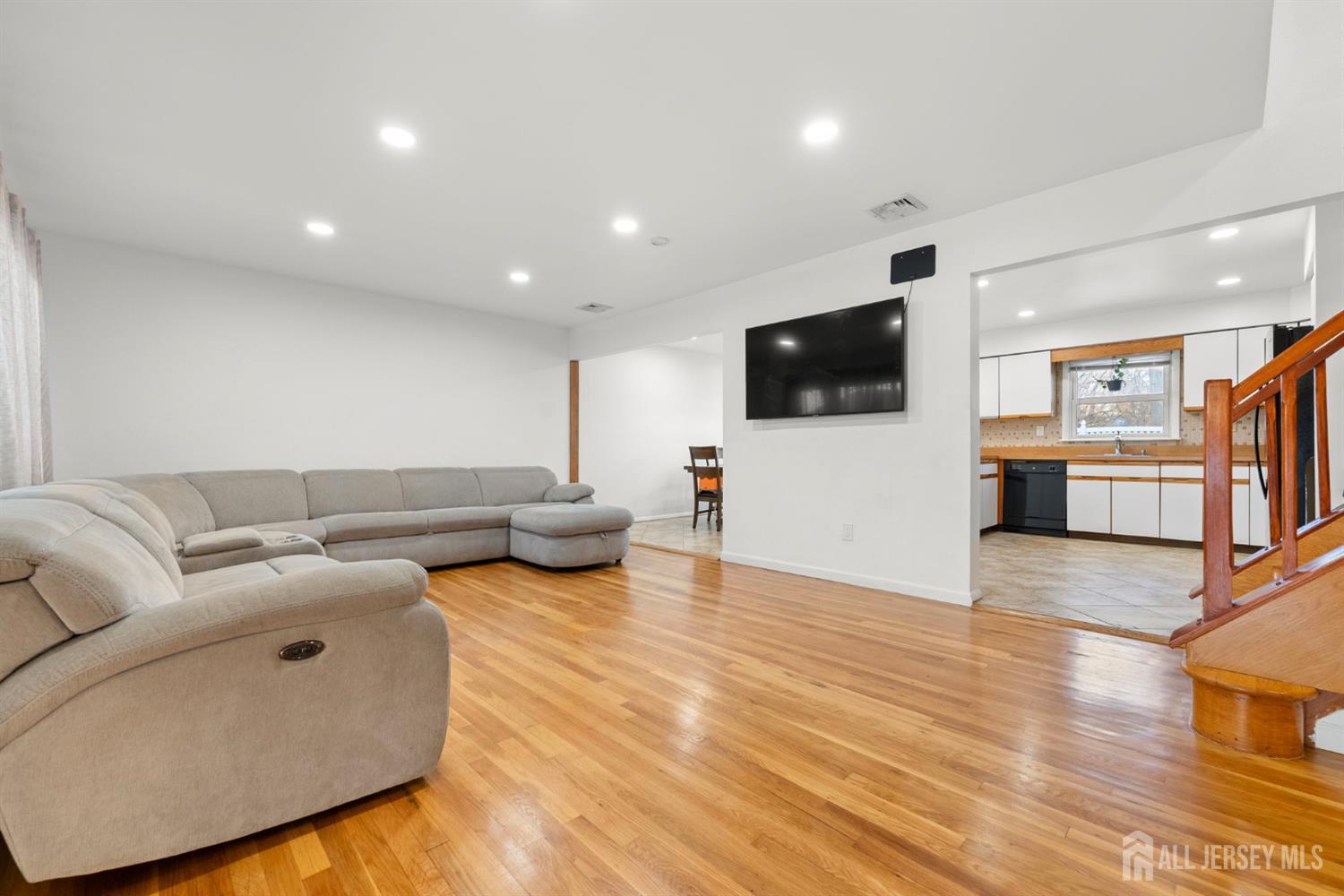 2291 Morrison Avenue Union, NJ 07083 - Photo 6 of 28 a living room with furniture and a flat screen tv