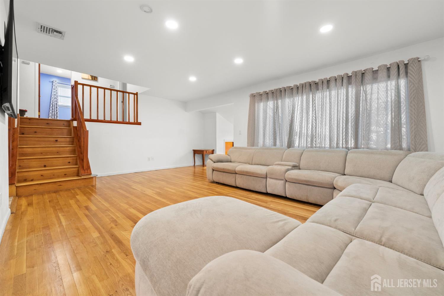 2291 Morrison Avenue Union, NJ 07083 - Photo 8 of 28 a bedroom with furniture and a wooden floor