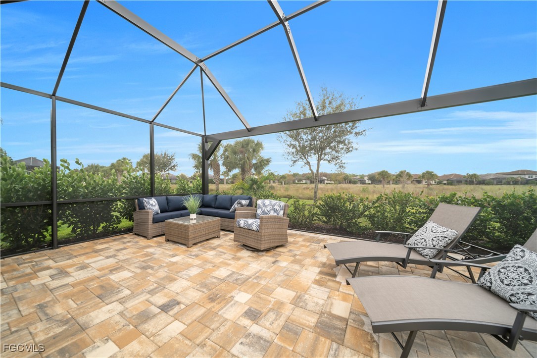 19918 Beverly Park Road Estero, FL 33928 - Photo 22 of 46 a view of outdoor space yard and patio