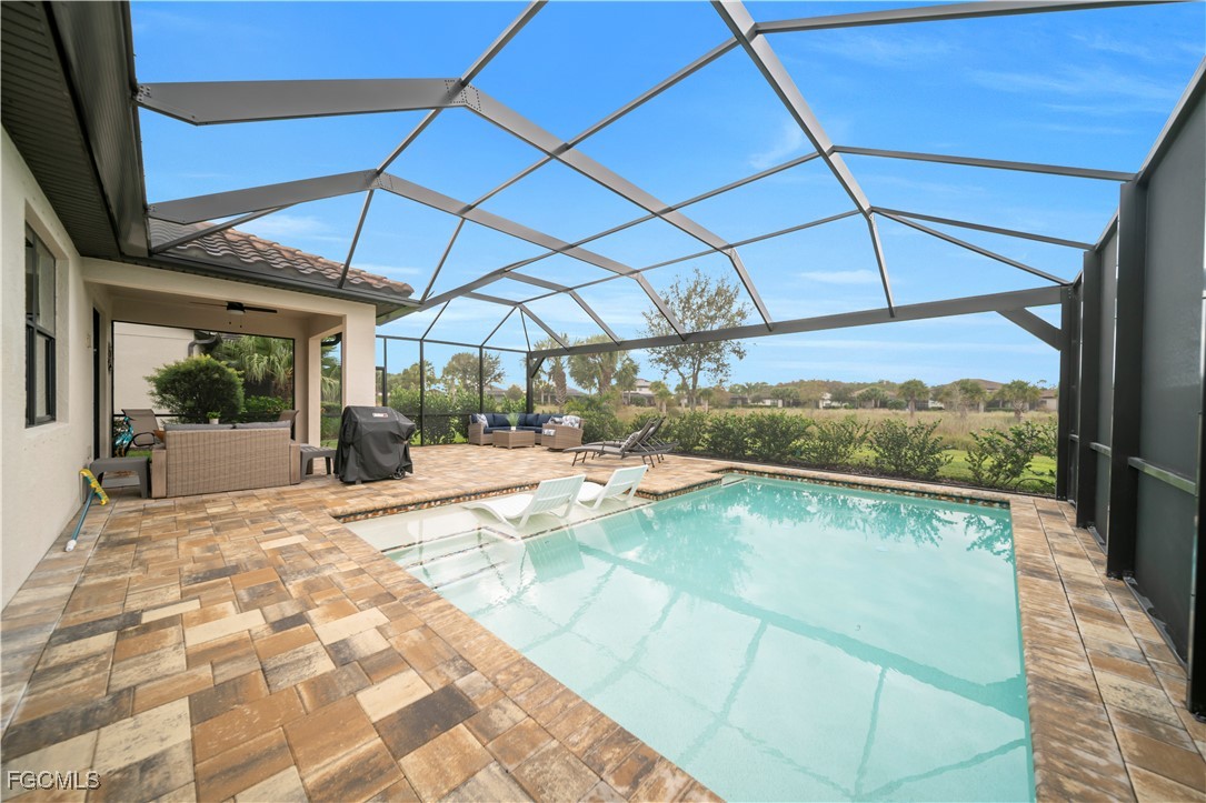 19918 Beverly Park Road Estero, FL 33928 - Photo 24 of 46 a view of a backyard of a house