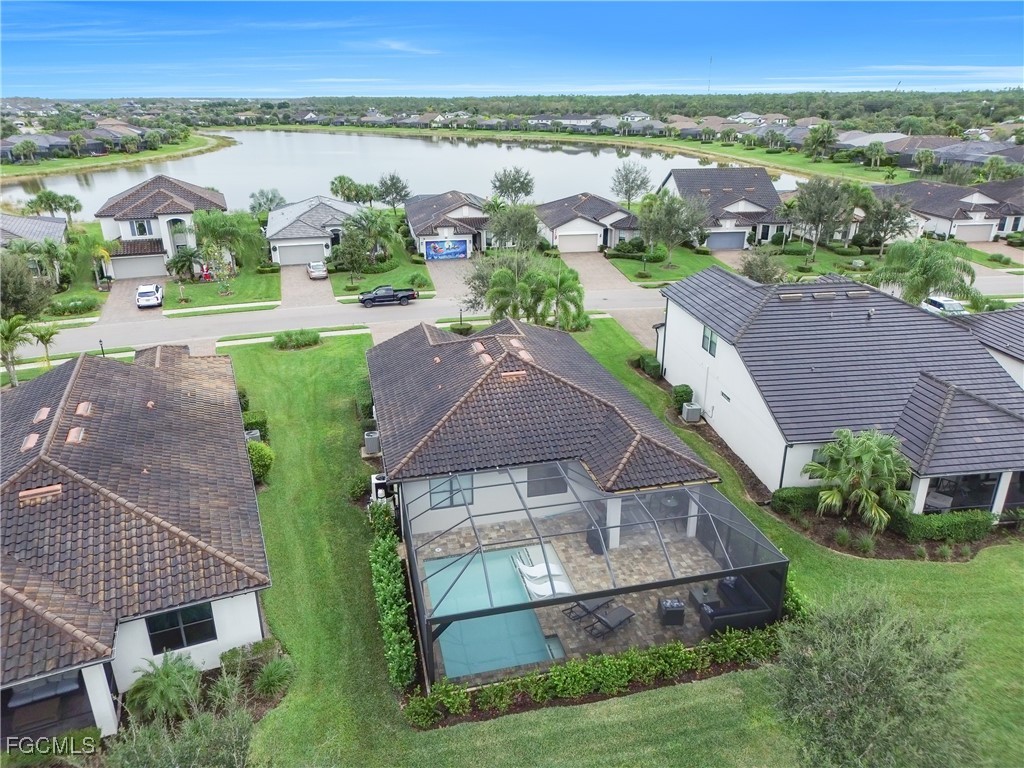 19918 Beverly Park Road Estero, FL 33928 - Photo 34 of 46 an aerial view of a house with a garden