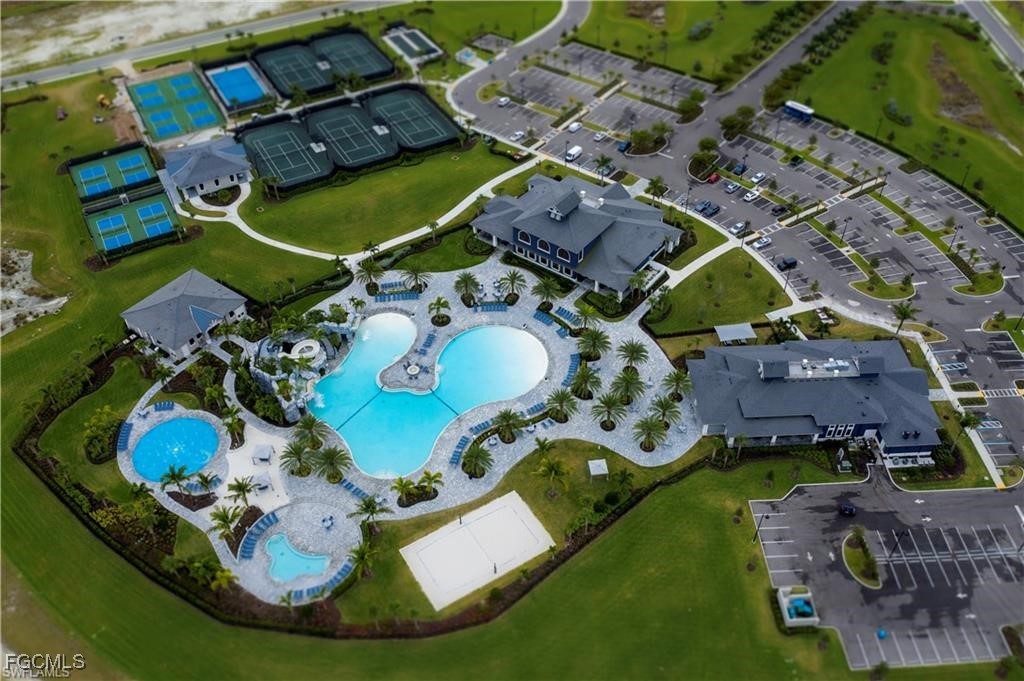 19918 Beverly Park Road Estero, FL 33928 - Photo 38 of 46 an aerial view of a house with a swimming pool yard and outdoor seating