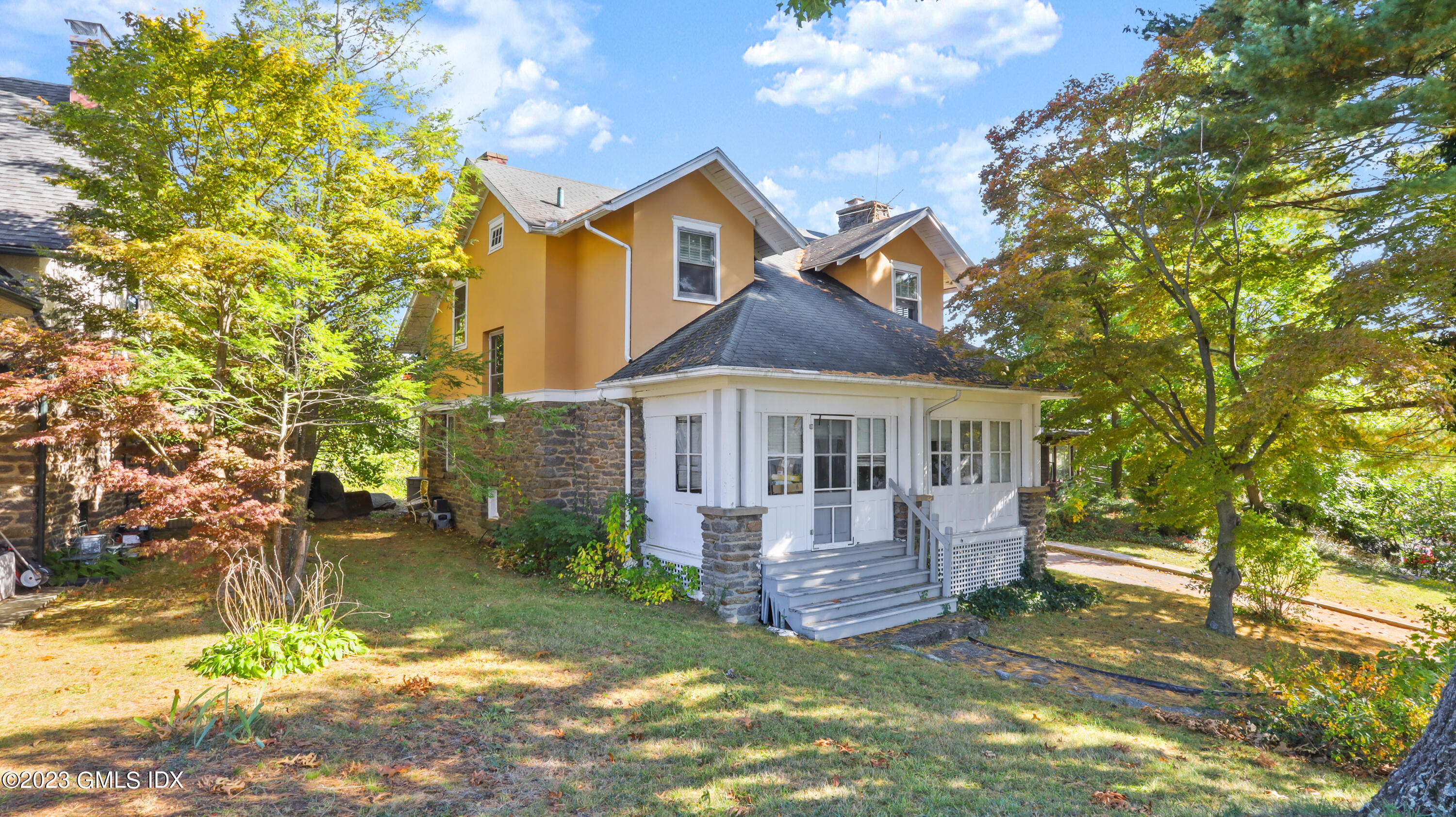 75 Havemeyer Place Greenwich, CT 06830 - Photo 1 of 3 a view of a house with a yard