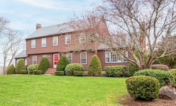 1091 Bay Road Hamilton, MA 01982 - Photo 1 of 40 a front view of a house with garden