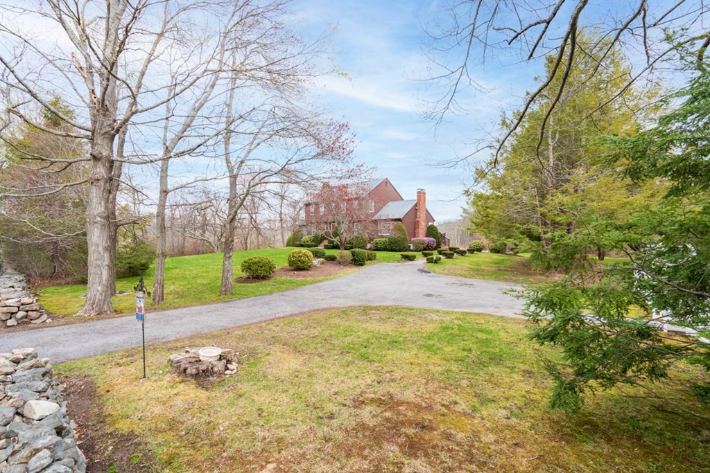 1091 Bay Road Hamilton, MA 01982 - Photo 2 of 40 a view of a yard with a house