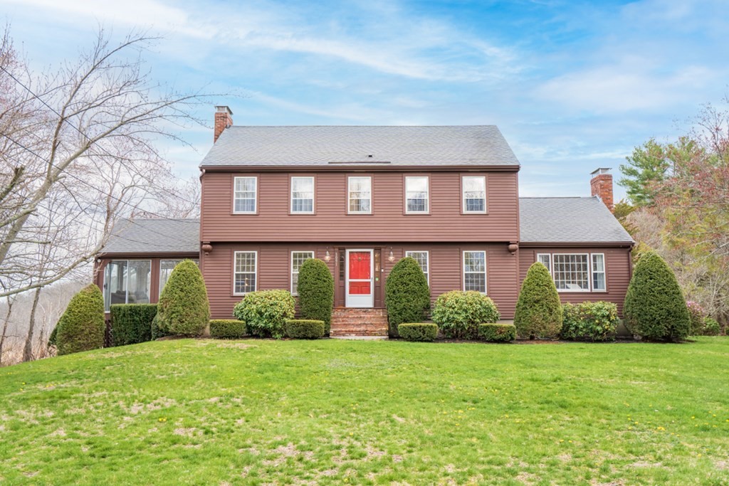 1091 Bay Road Hamilton, MA 01982 - Photo 3 of 40 a front view of a house with garden
