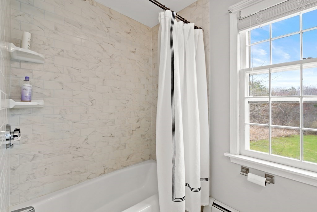 1091 Bay Road Hamilton, MA 01982 - Photo 31 of 40 a bathroom with a shower and a tub