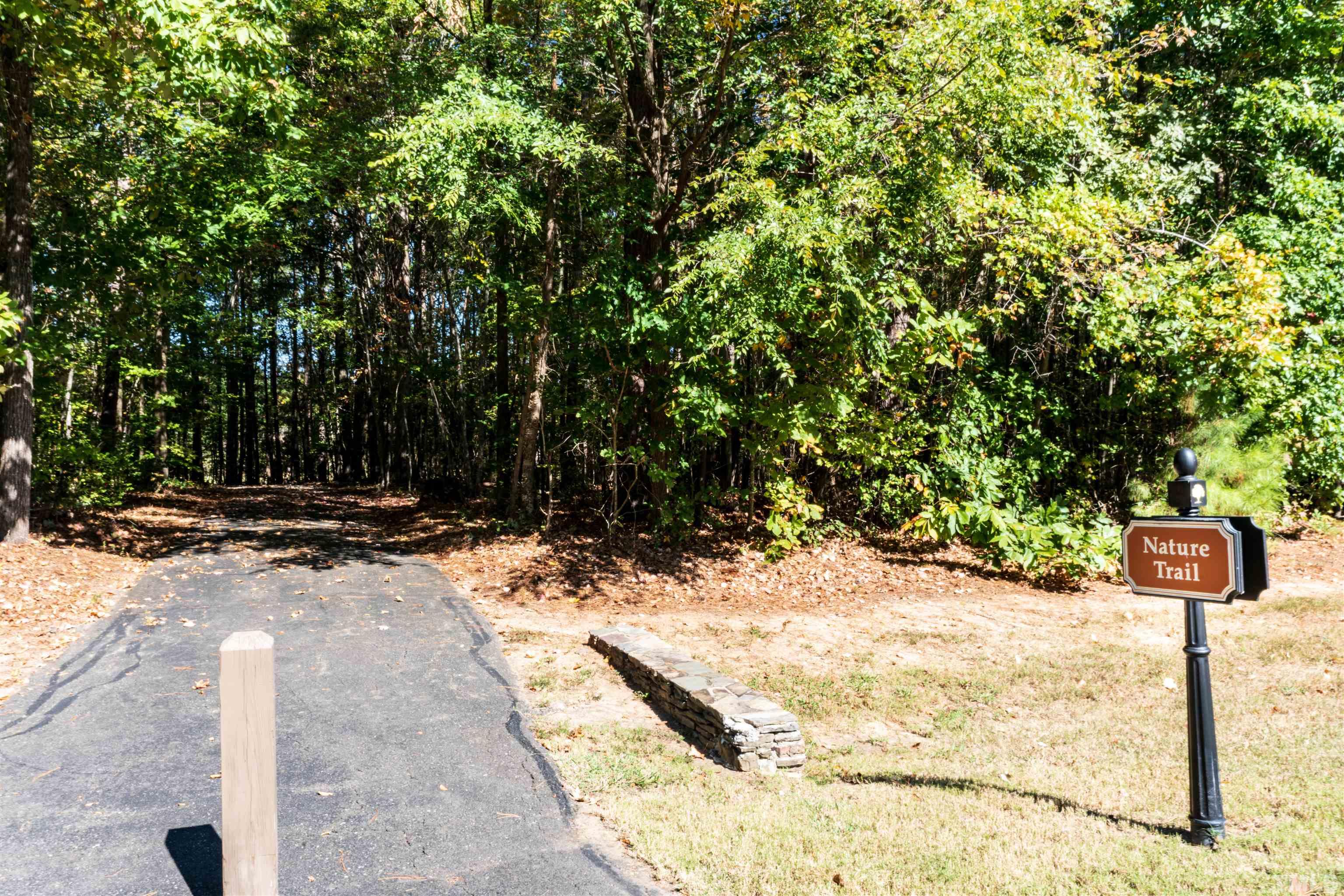 110 Turner Ridge Circle Durham, NC 27713 - Photo 11 of 12 a view of a street with a tree