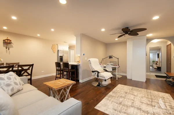 a living room with furniture rug and window