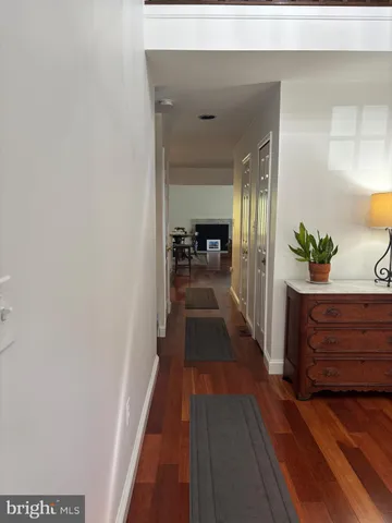 a hallway with wooden floor