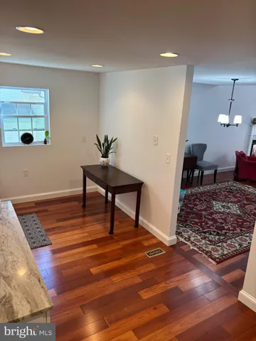 a living room with wooden floor