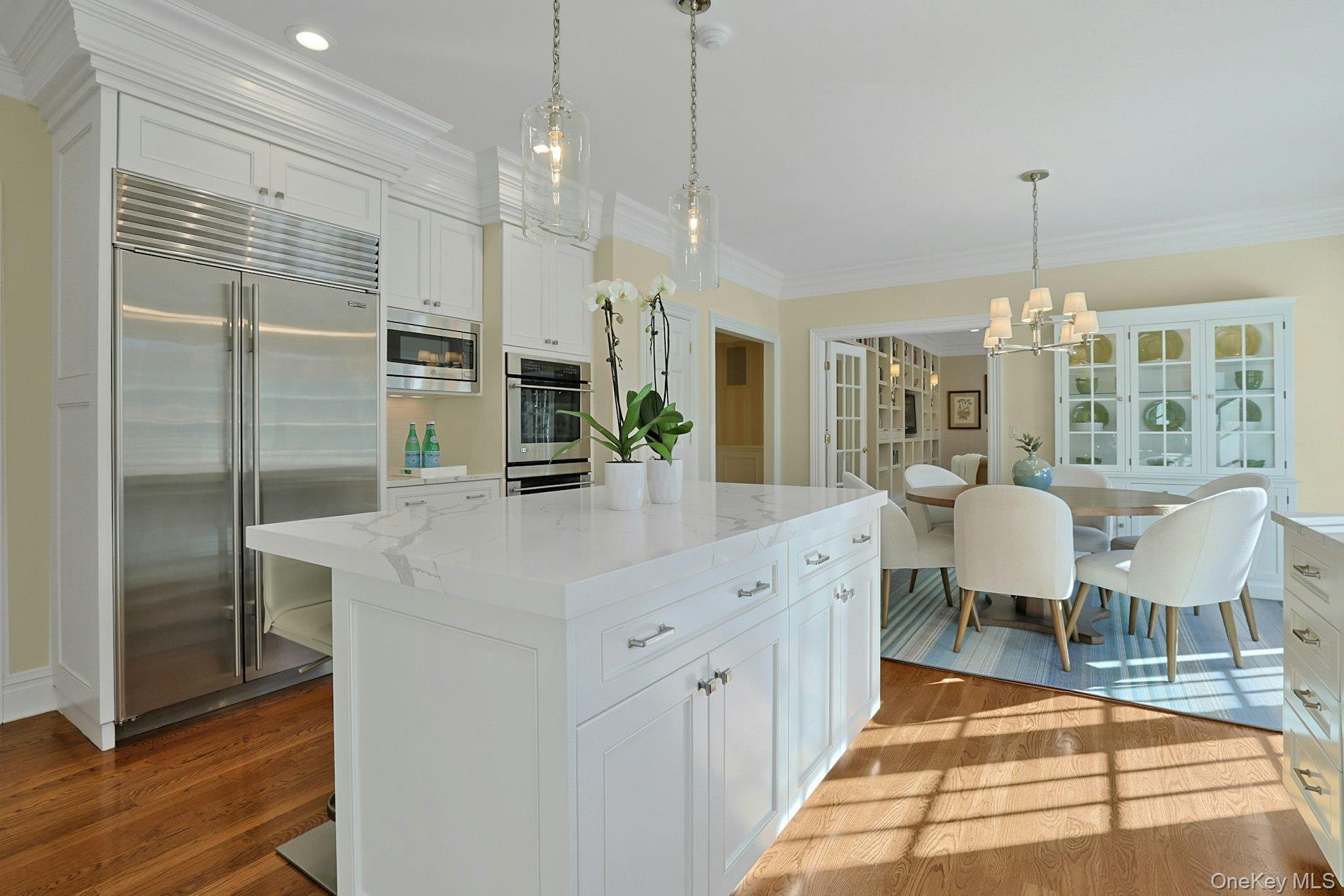 24 Fairview Road Scarsdale, NY 10583 - Photo 11 of 48 Another view showcases the thoughtfully designed layout, walk-in pantry and Sub-Zero refrigerator/freezer, —where style meets exceptional functionality.