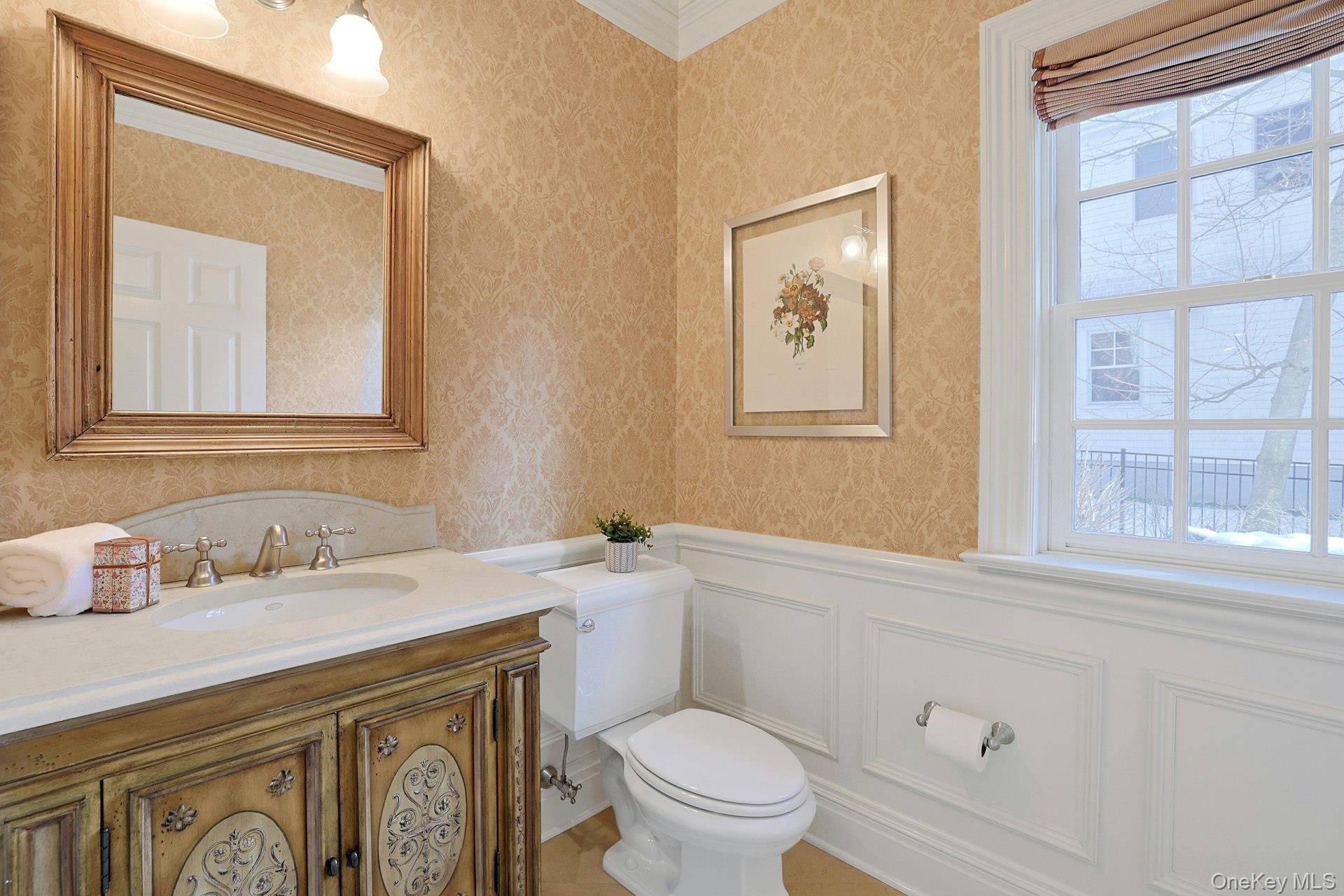 24 Fairview Road Scarsdale, NY 10583 - Photo 15 of 48 Well-appointed main-level powder room with elegant detailing.