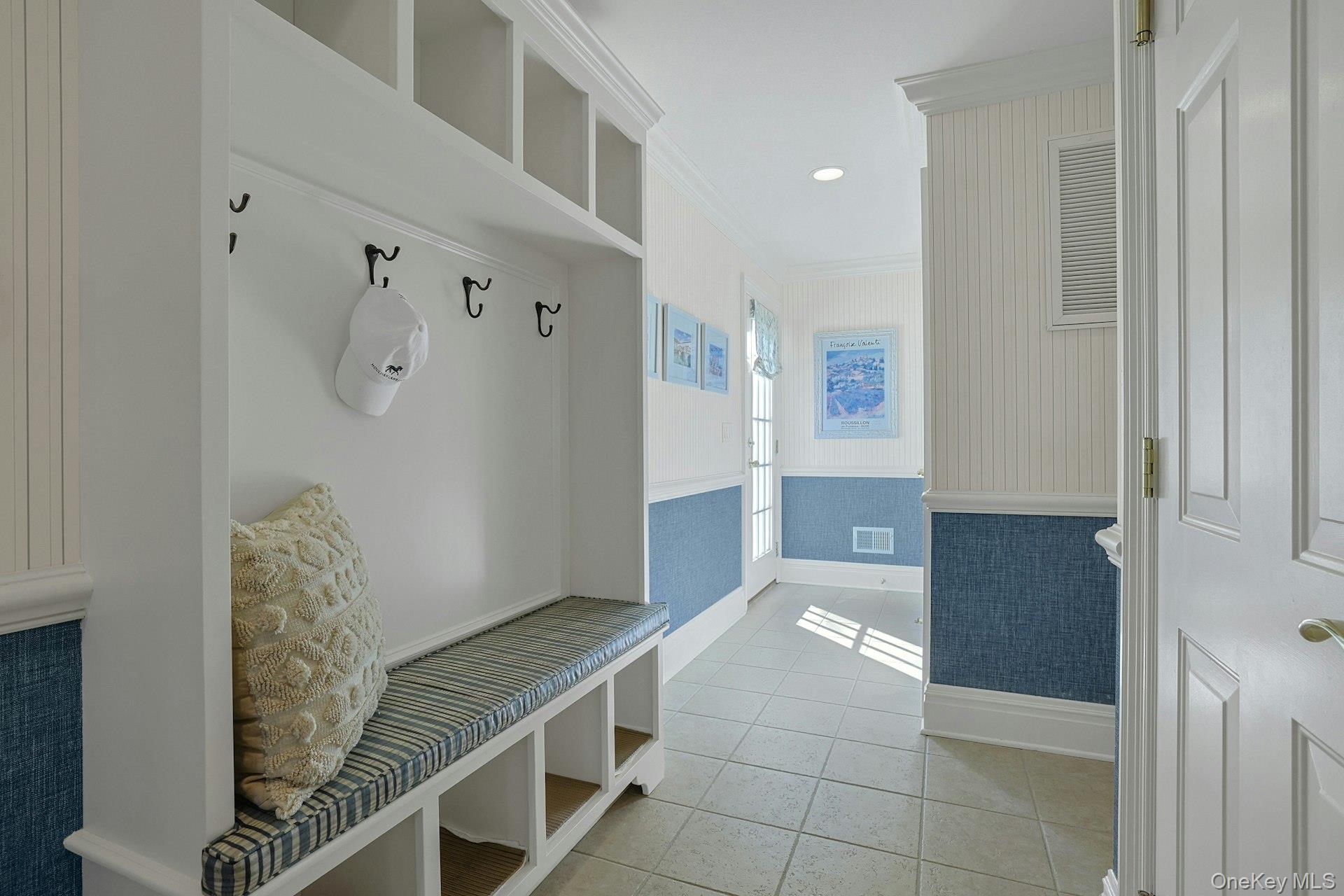 24 Fairview Road Scarsdale, NY 10583 - Photo 18 of 48 Designed for modern living, this mudroom offers stylish built-ins and practical organization for busy households.