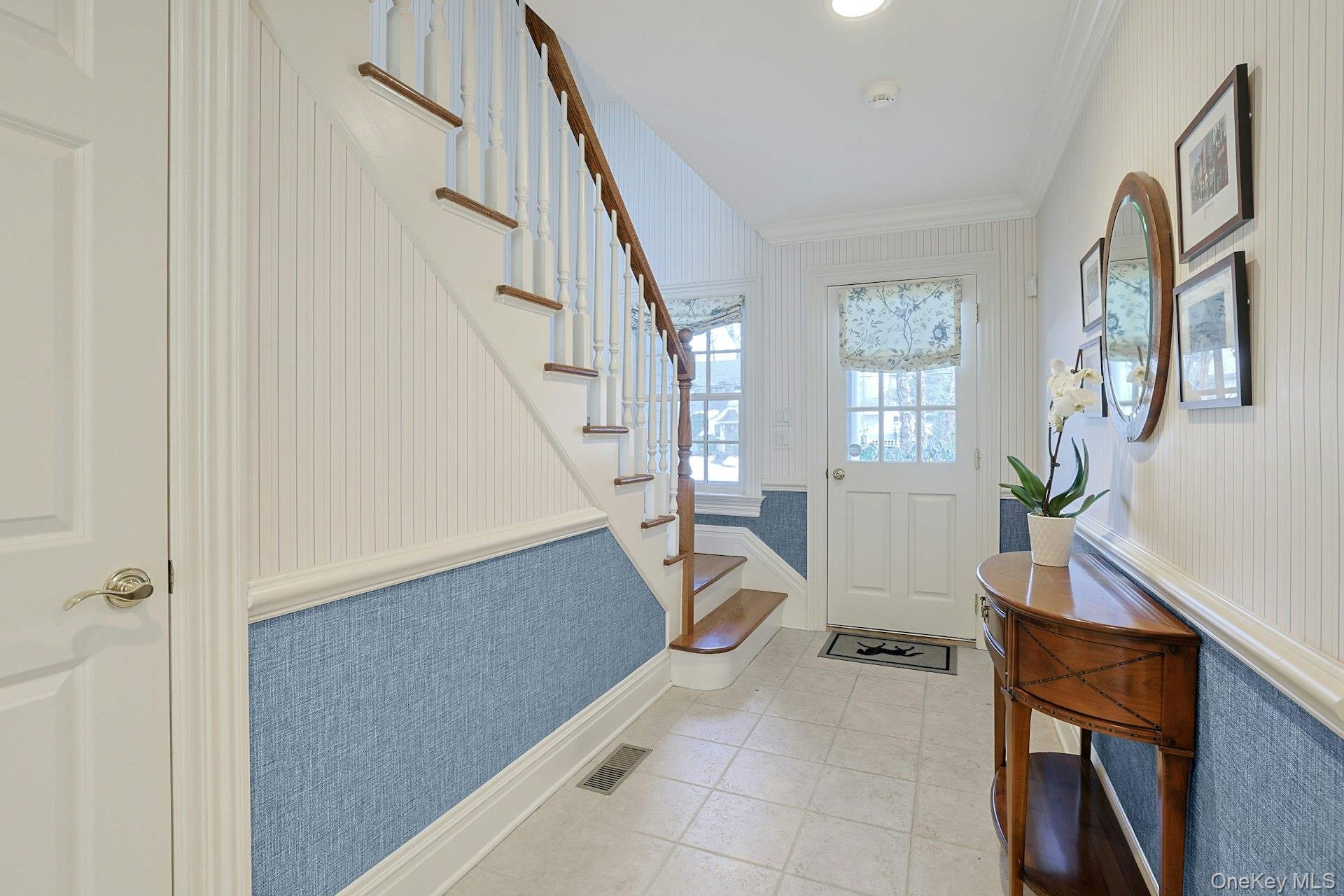 24 Fairview Road Scarsdale, NY 10583 - Photo 19 of 48 Convenient back staircase and hallway with side entrance, offering excellent flow between indoor and outdoor spaces.