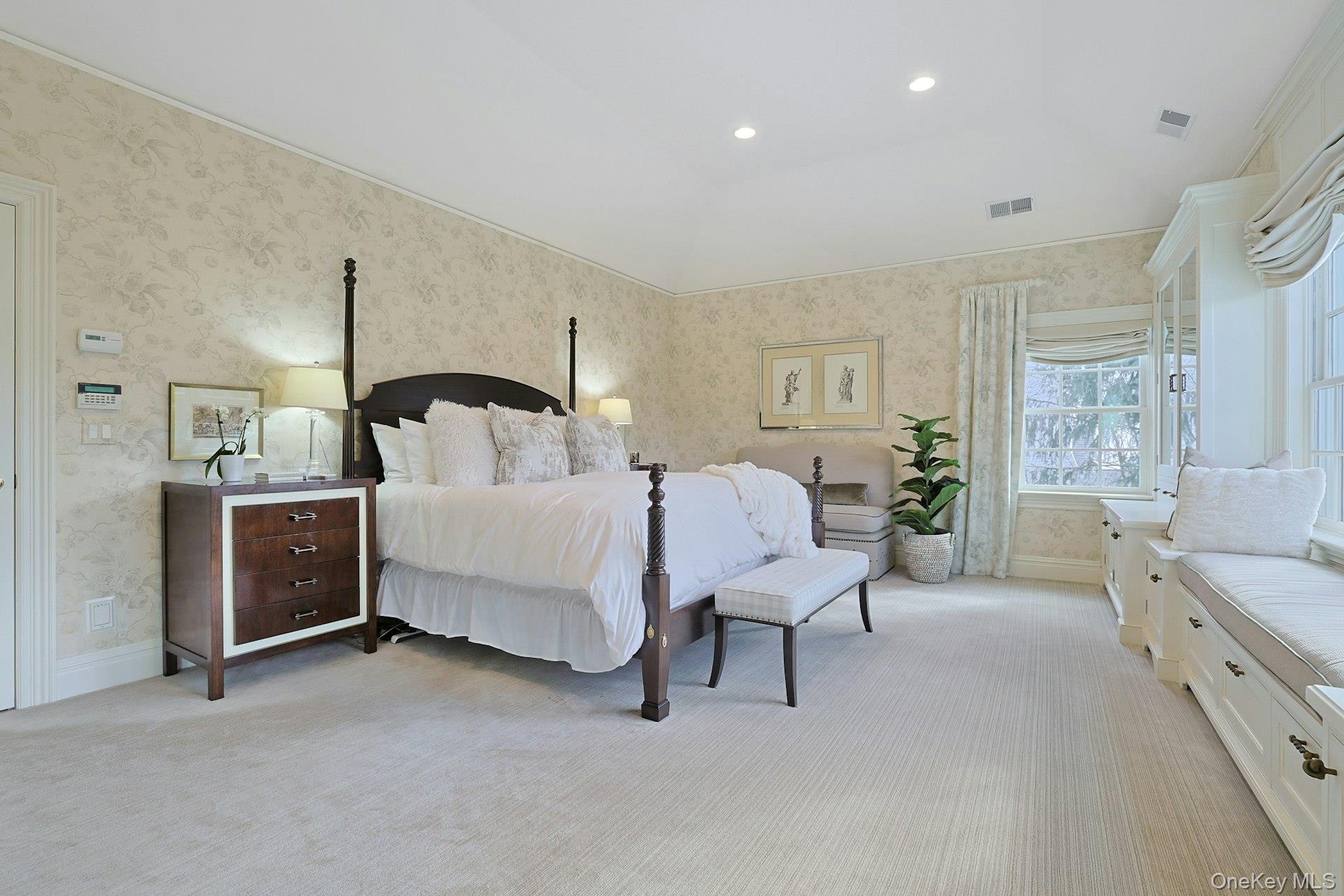 24 Fairview Road Scarsdale, NY 10583 - Photo 20 of 48 A serene primary retreat featuring generous proportions, custom built-in storage, and abundant natural light.