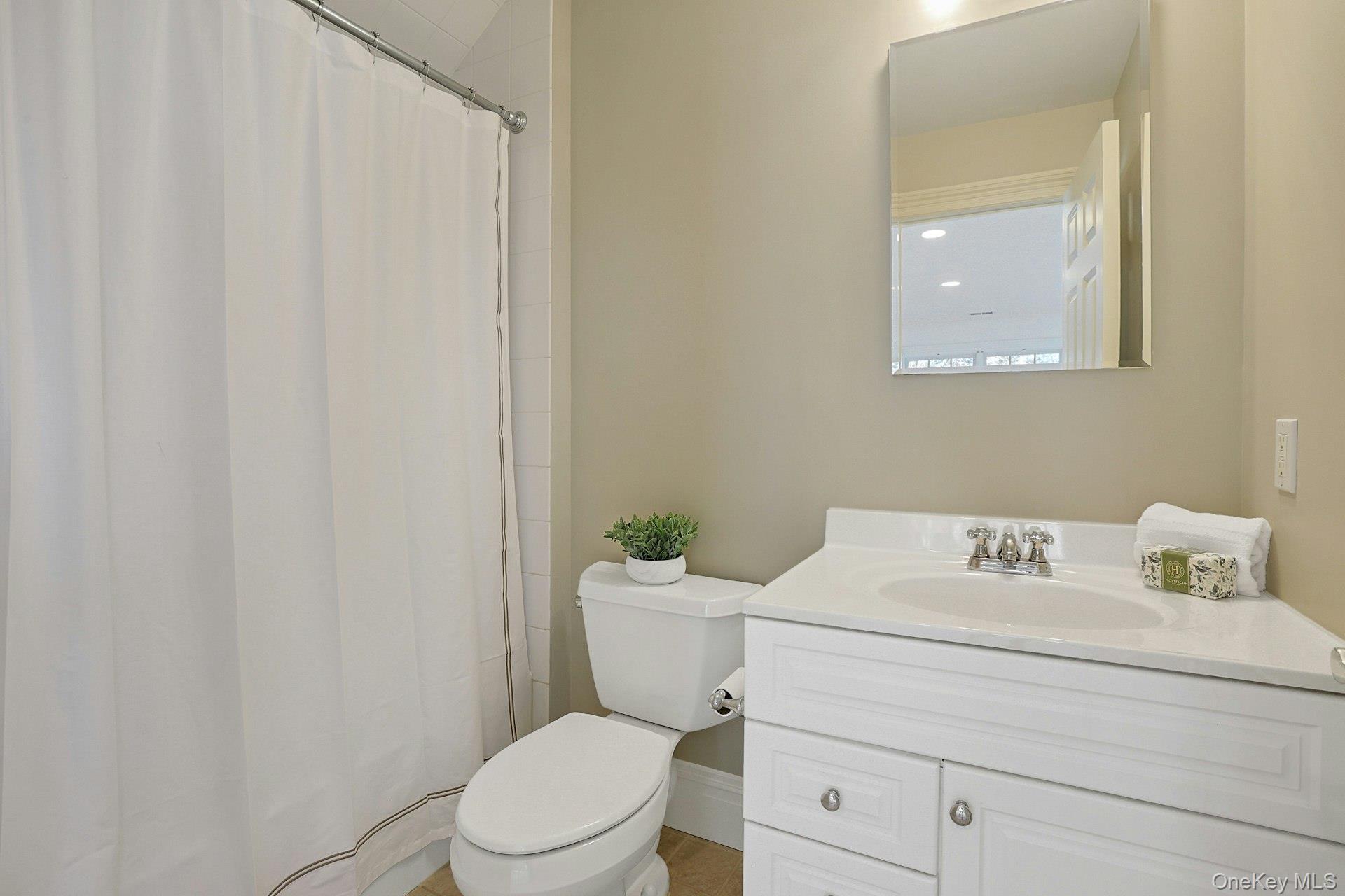 24 Fairview Road Scarsdale, NY 10583 - Photo 31 of 48 Private full bath serving the spacious bonus room, offering comfort and convenience.