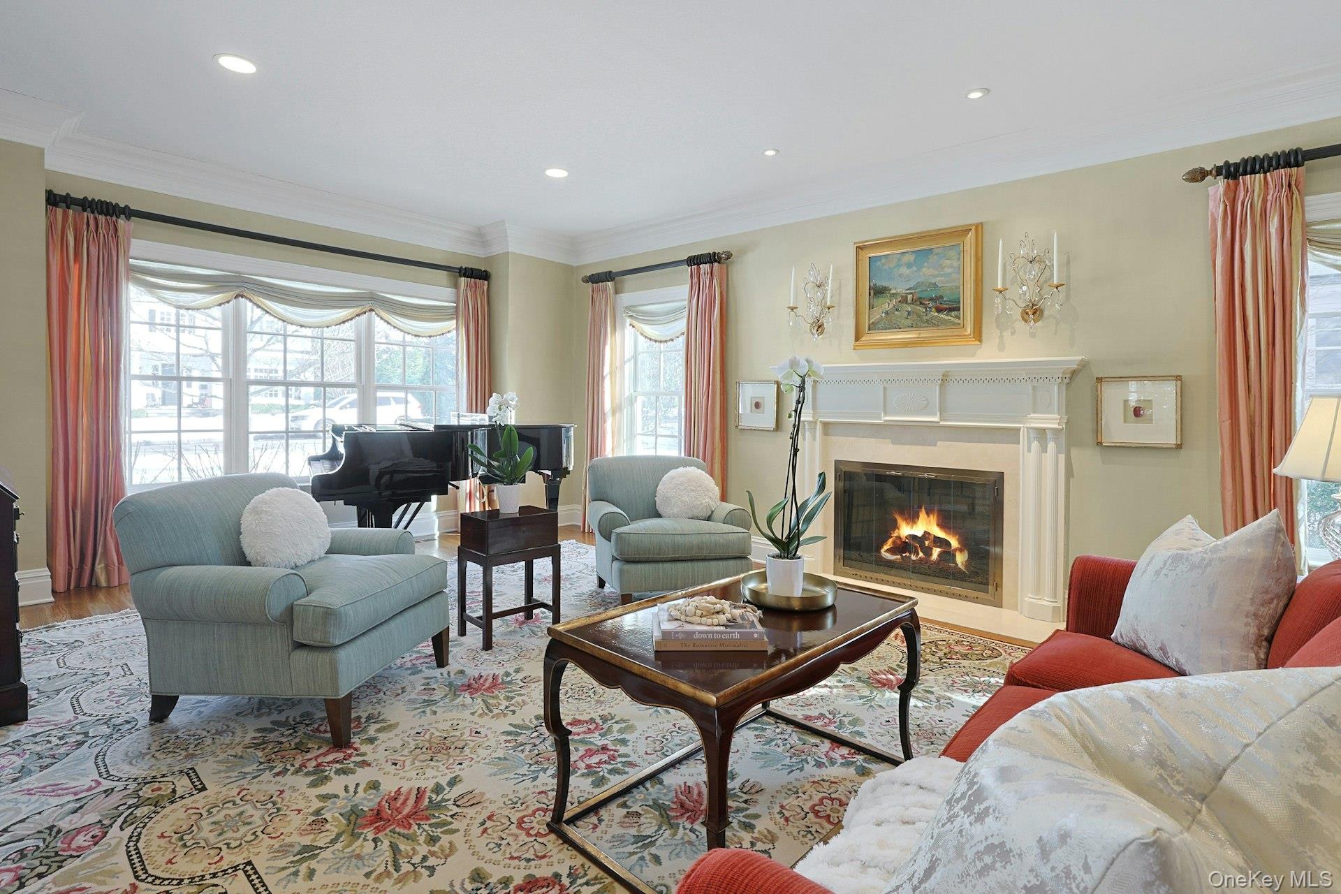24 Fairview Road Scarsdale, NY 10583 - Photo 5 of 48 Designed for comfort and conversation, this gracious living room blends warmth, elegance, and natural light.