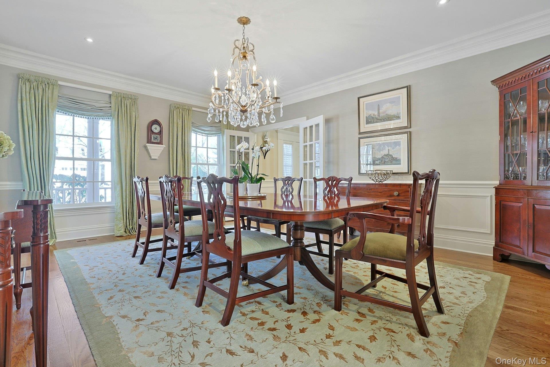 24 Fairview Road Scarsdale, NY 10583 - Photo 7 of 48 A gracious formal dining room with classic wainscoting and beautiful proportions, ideal for hosting memorable gatherings and holiday celebrations.