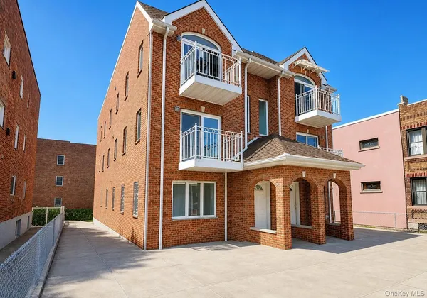 a front view of a house with a porch
