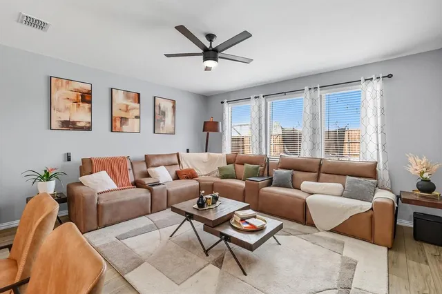 a large white kitchen with lots of counter space and appliances