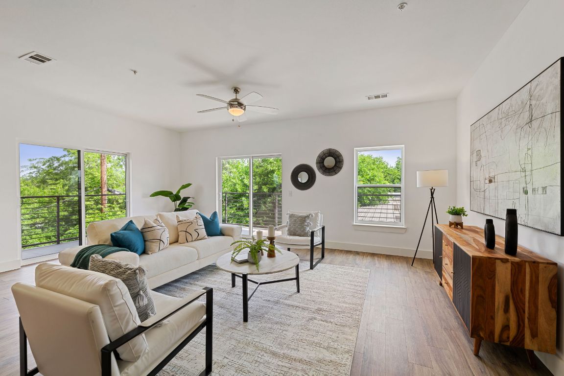 6444 Burnet Road, Unit 204 Austin, TX 78757 - Photo 2 of 36 a living room with furniture and a window