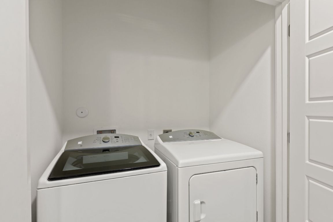 6444 Burnet Road, Unit 204 Austin, TX 78757 - Photo 24 of 36 a utility room with dryer and washer