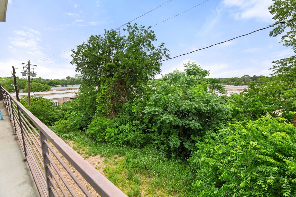 6444 Burnet Road, Unit 204 Austin, TX 78757 - Photo 30 of 36 a view of a garden from a balcony