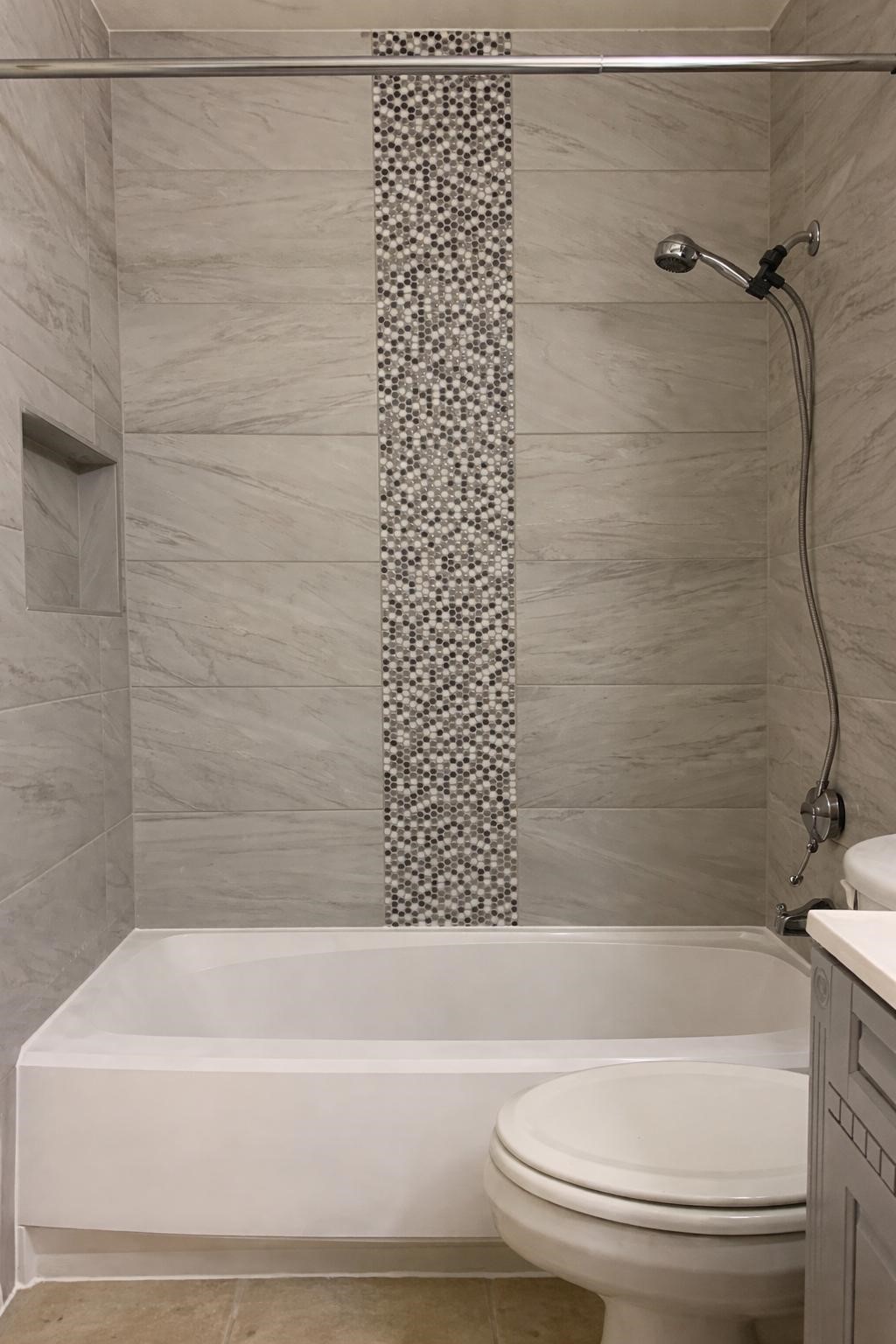 3055 Walnut Bend Lane, Unit 36 Houston, TX 77042 - Photo 11 of 16 a bathroom with a bathtub and a shower