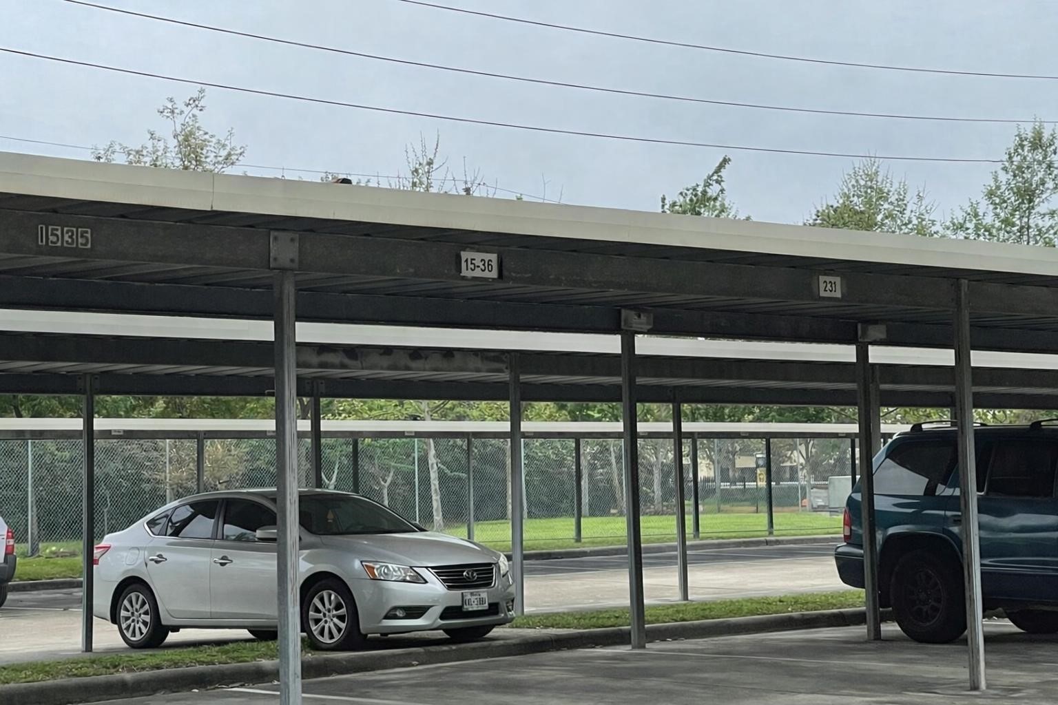 3055 Walnut Bend Lane, Unit 36 Houston, TX 77042 - Photo 16 of 16 a view of a car parked in garage
