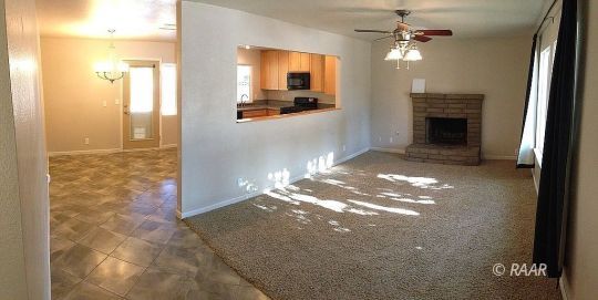 1224 North Erwin Street Ridgecrest, CA 93555 - Photo 6 of 30 a view of a livingroom with a flat screen tv