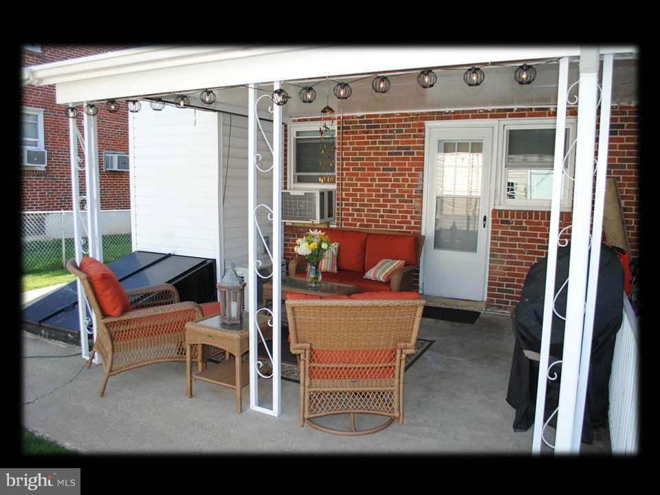 8612 Willow Oak Road Baltimore, MD 21234 - Photo 15 of 30 REAR COVERED CONCRETE PATIO