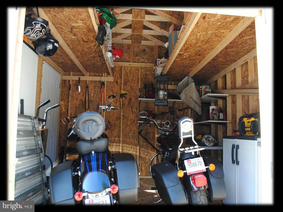 8612 Willow Oak Road Baltimore, MD 21234 - Photo 18 of 30 INSIDE OF MINI GARAGE (FITS 2 MOTORCYCLES)