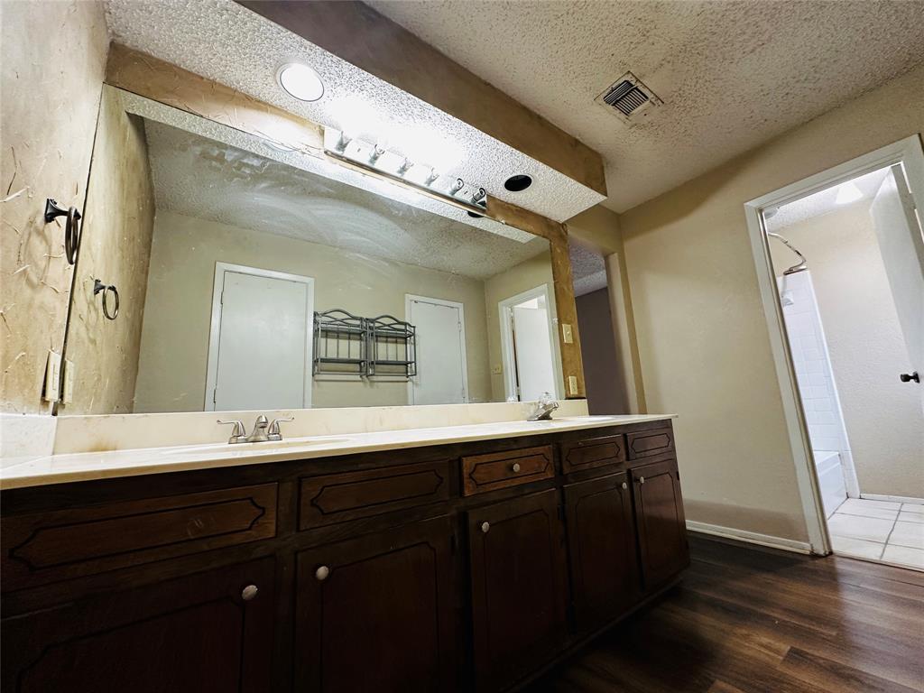 6741 Ridgetop Road North Richland Hills, TX 76182 - Photo 32 of 40 Primary Bathroom with dual sinks