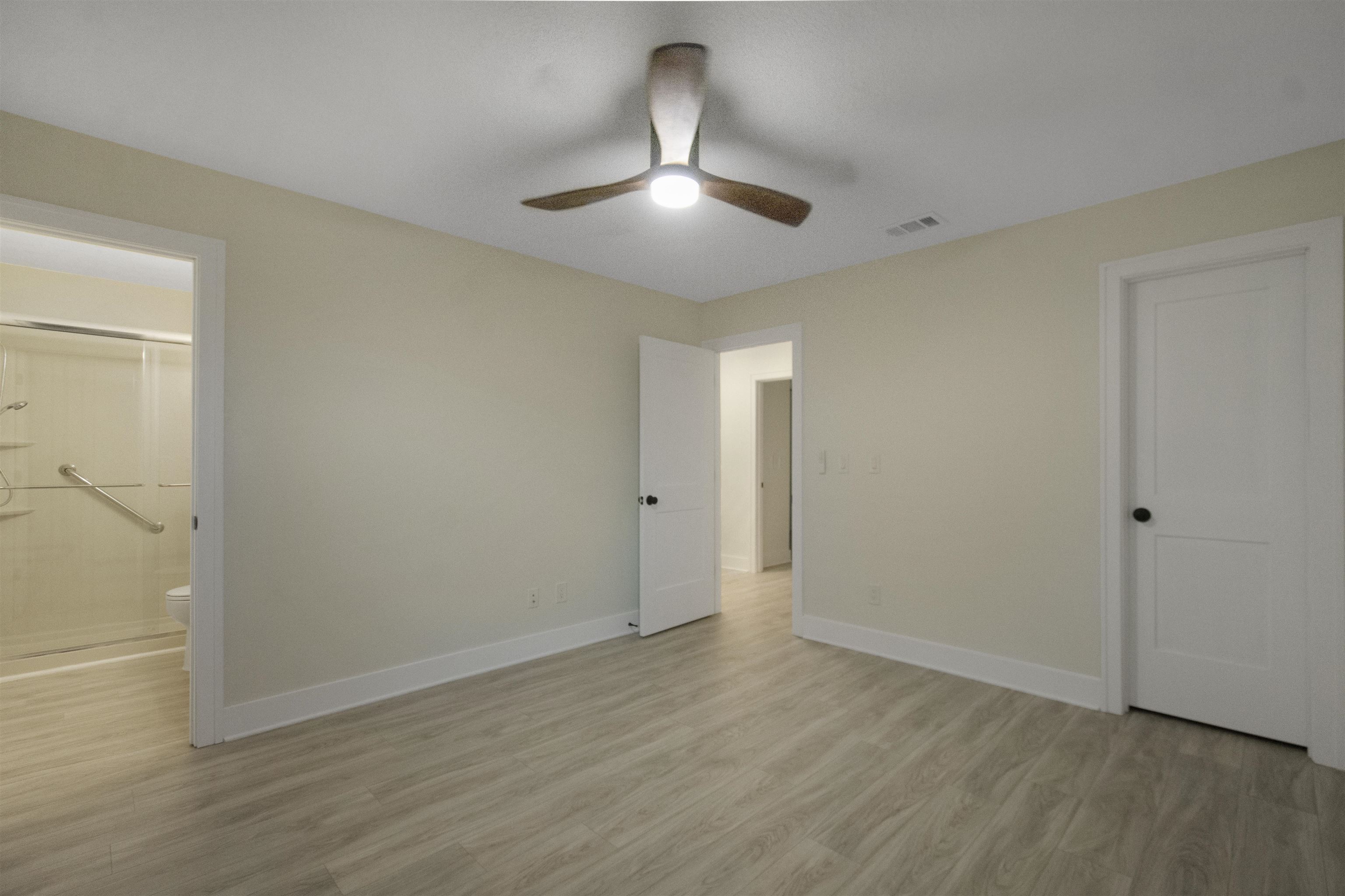 209 Jasmine Road St. Augustine, FL 32086 - Photo 13 of 25 wooden floor in an empty room