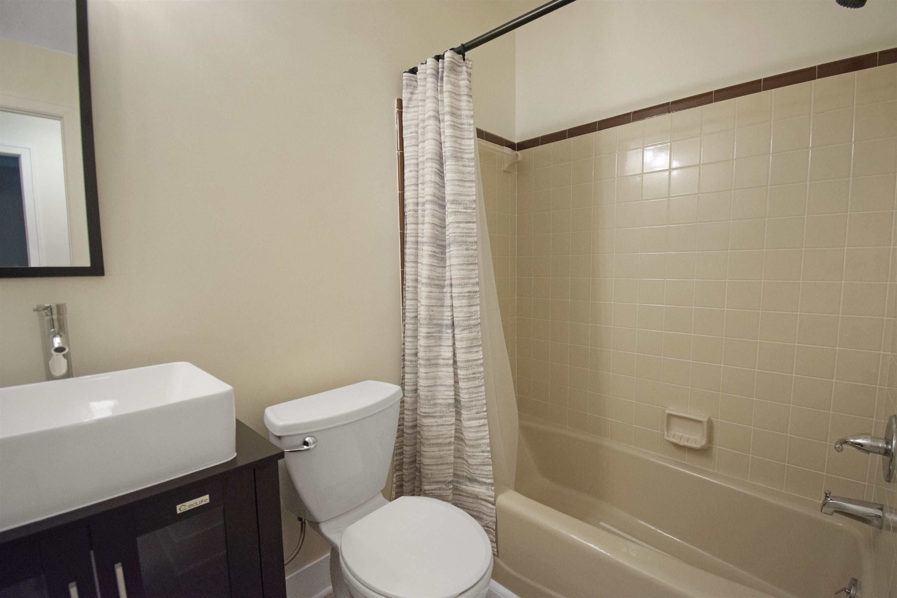 209 Jasmine Road St. Augustine, FL 32086 - Photo 17 of 25 a bathroom with a sink toilet and shower