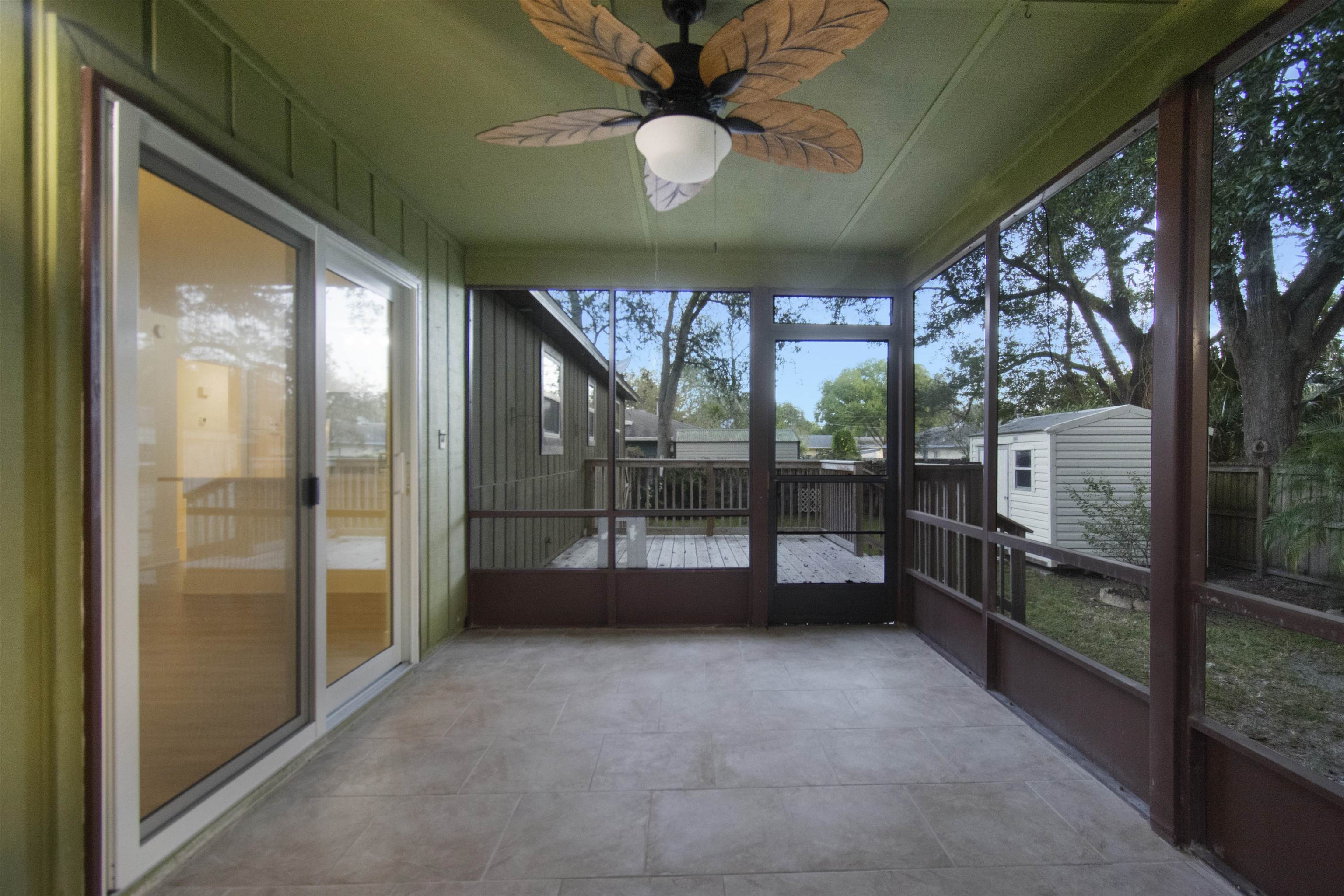 209 Jasmine Road St. Augustine, FL 32086 - Photo 18 of 25 a view of an empty room with a balcony