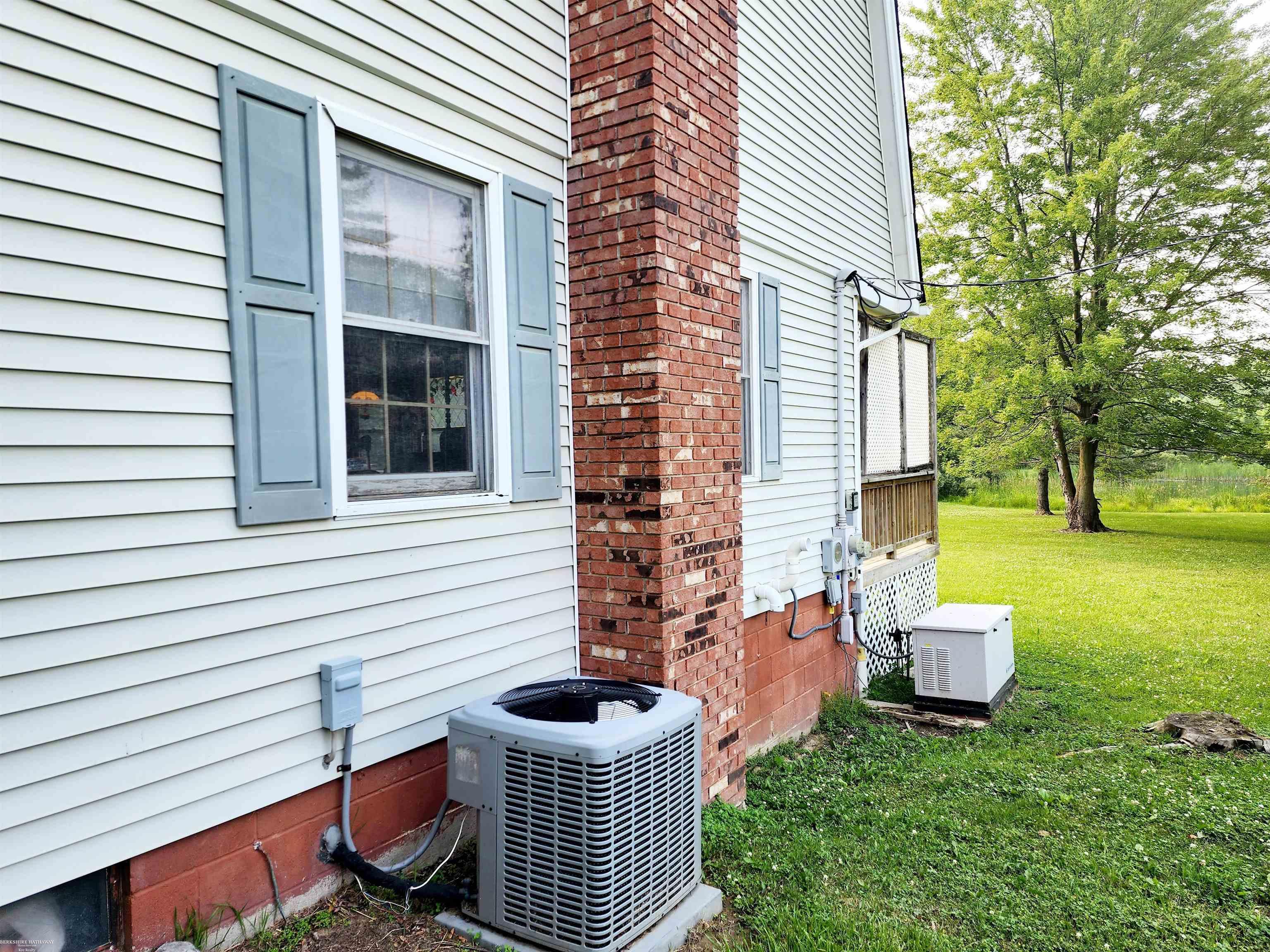 12606 Dunn Road Memphis, MI 48041 - Photo 9 of 34 Generator and newer A/C unit